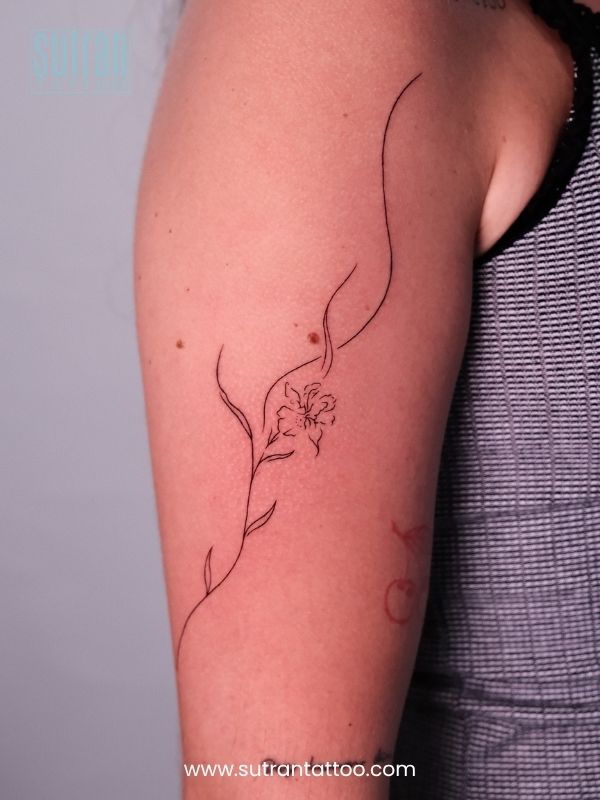 Fine Line Flower Tattoo