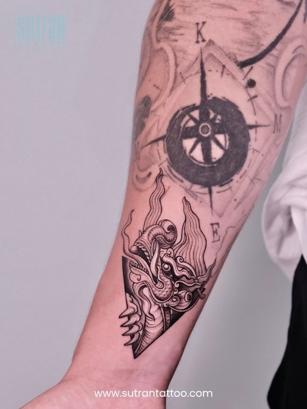 Geometric Compass and Wave Tattoo