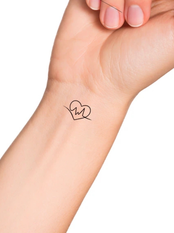 Impressive mini heartbeat tattoo design on wrist