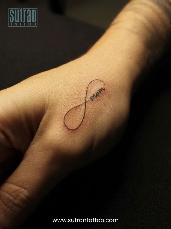 Mini tattoo on the back of hand