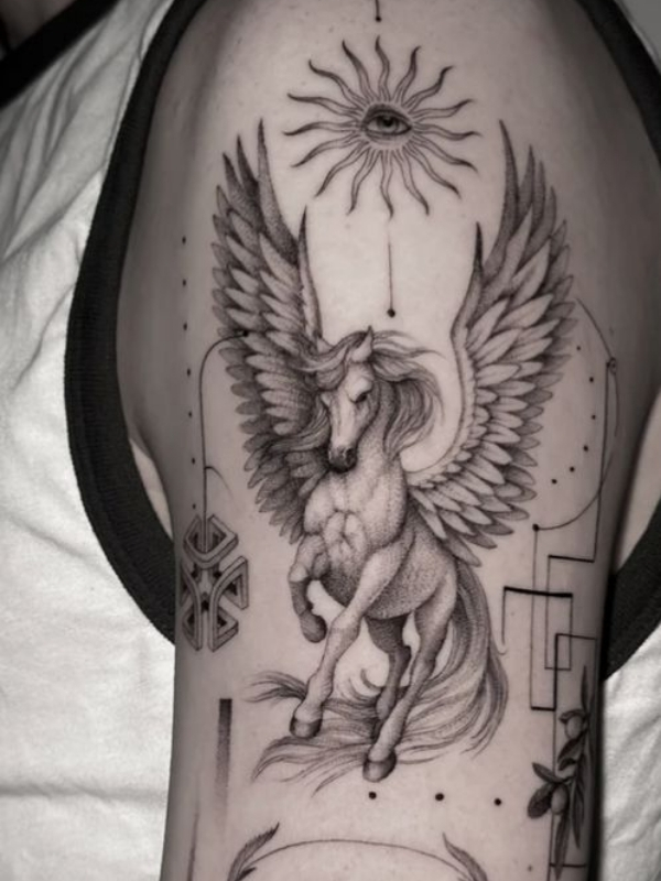 Powerful winged horse tattoo