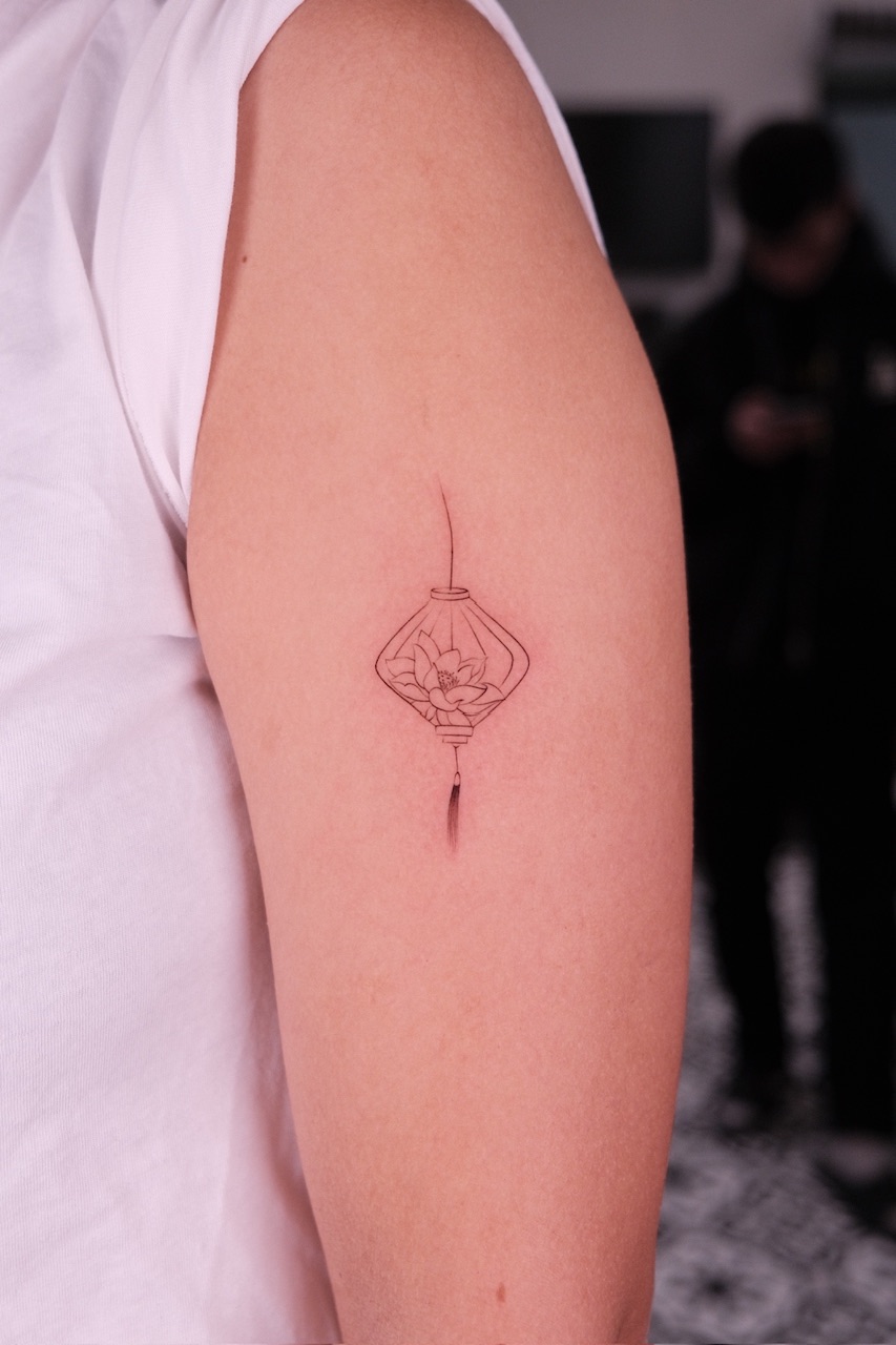 STAMP, LANTERN & HAND FAN - Postage stamp, lantern and hand fan tattoo at Sutran Tattoo Studio — design 222