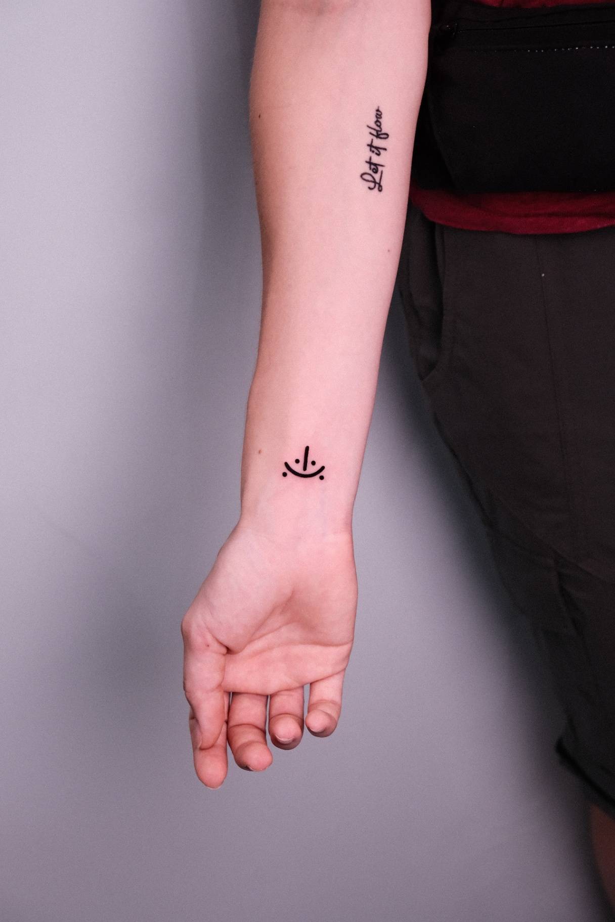Minimalist tattoo at Sutran Tattoo Studio — design 124