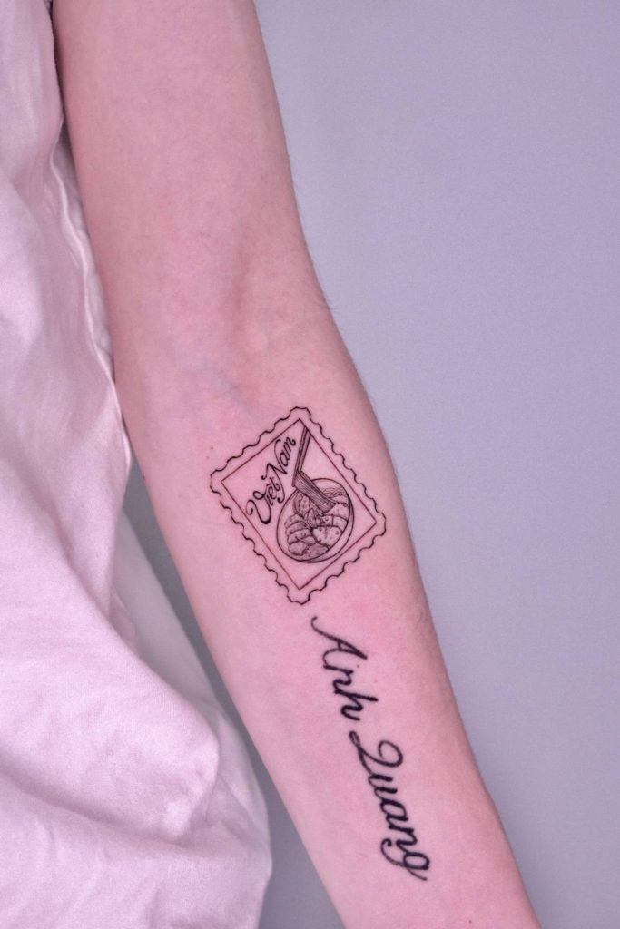 Postage stamp, lantern and hand fan tattoo at Sutran Tattoo Studio — design 123