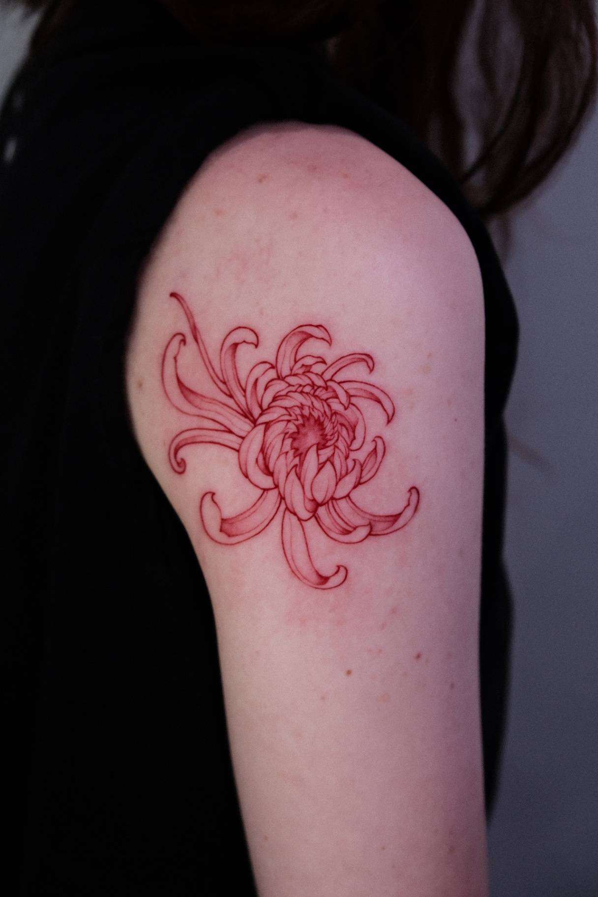 Fine-line tattoo at Sutran Tattoo Studio — design 486