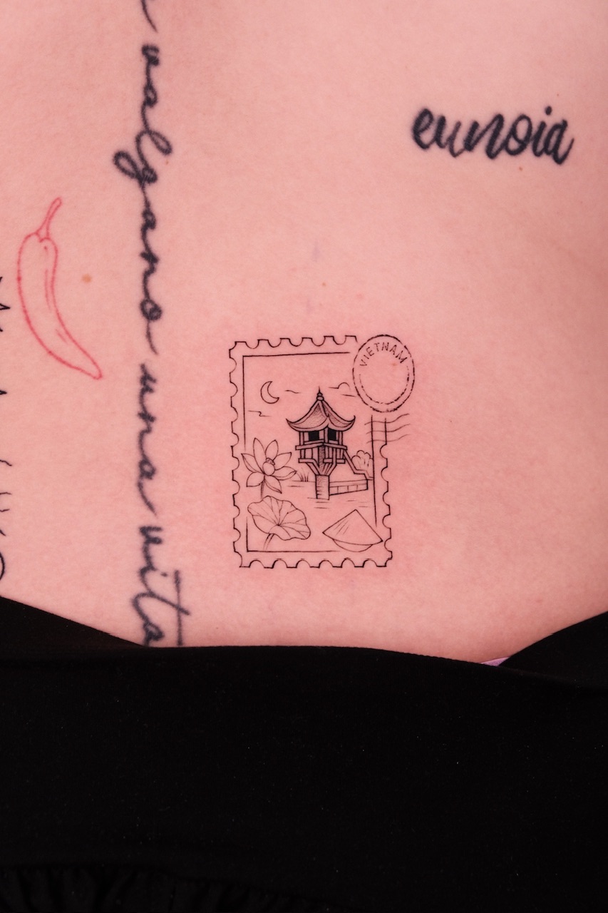 STAMP, LANTERN & HAND FAN - Postage stamp, lantern and hand fan tattoo at Sutran Tattoo Studio — design 219