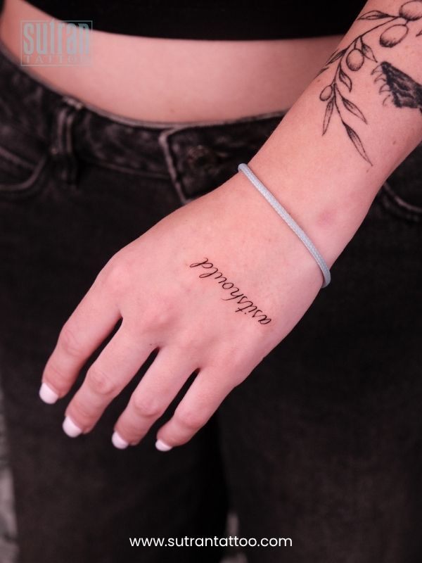 Back of hand tattoos