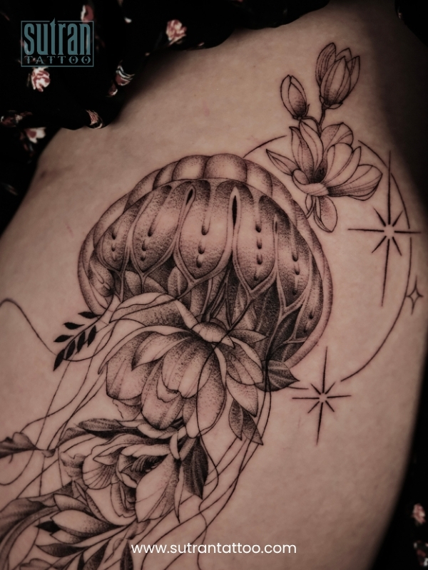Finished small tattoo on skin showing clean healed linework