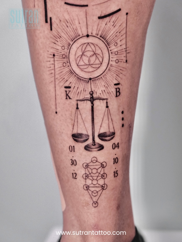 Intricate geometric balance tattoo