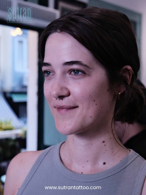 nostril and septum nose piercing