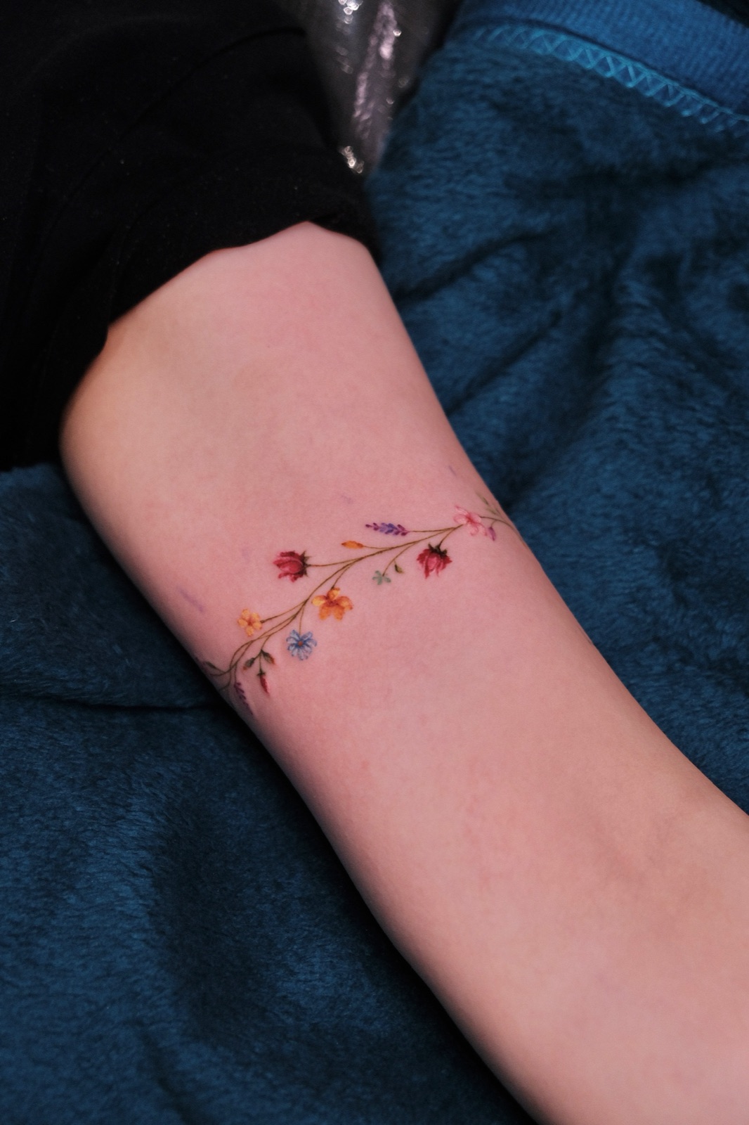 Colorful Floral Vine Wreath Tattoo Forearm — Su Tran Tattoo