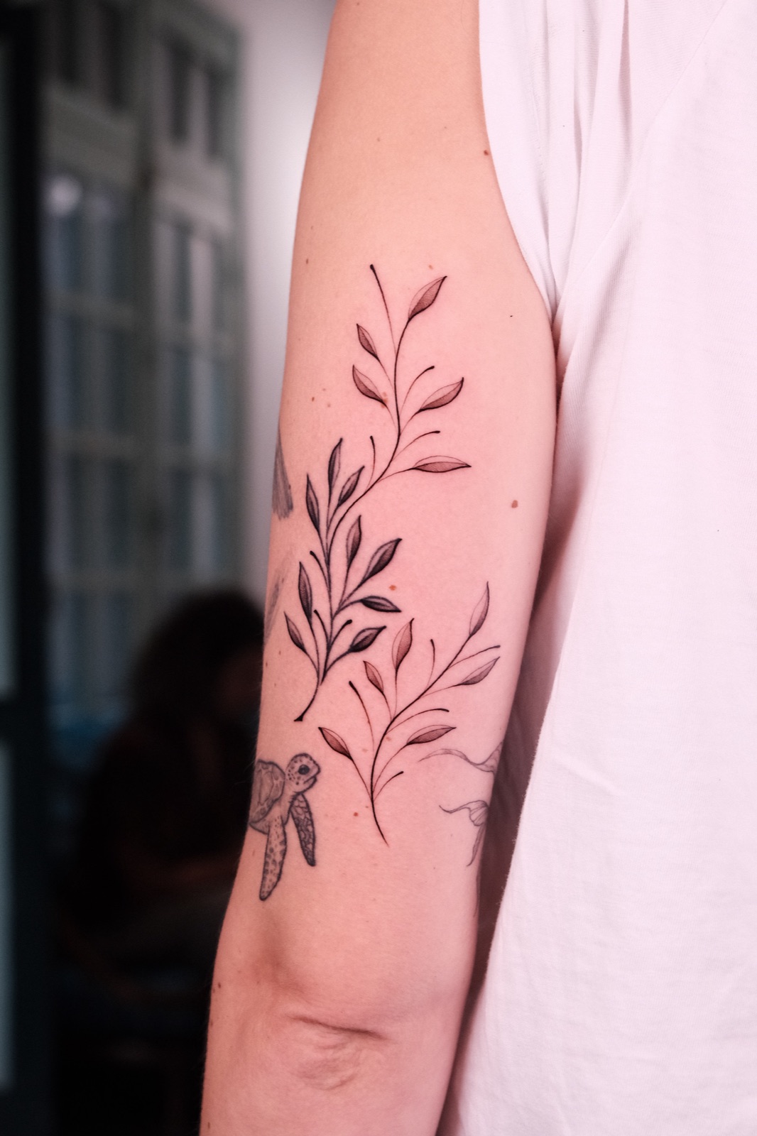 Fine Line Botanical Branch Tattoo Forearm — Su Tran Tattoo
