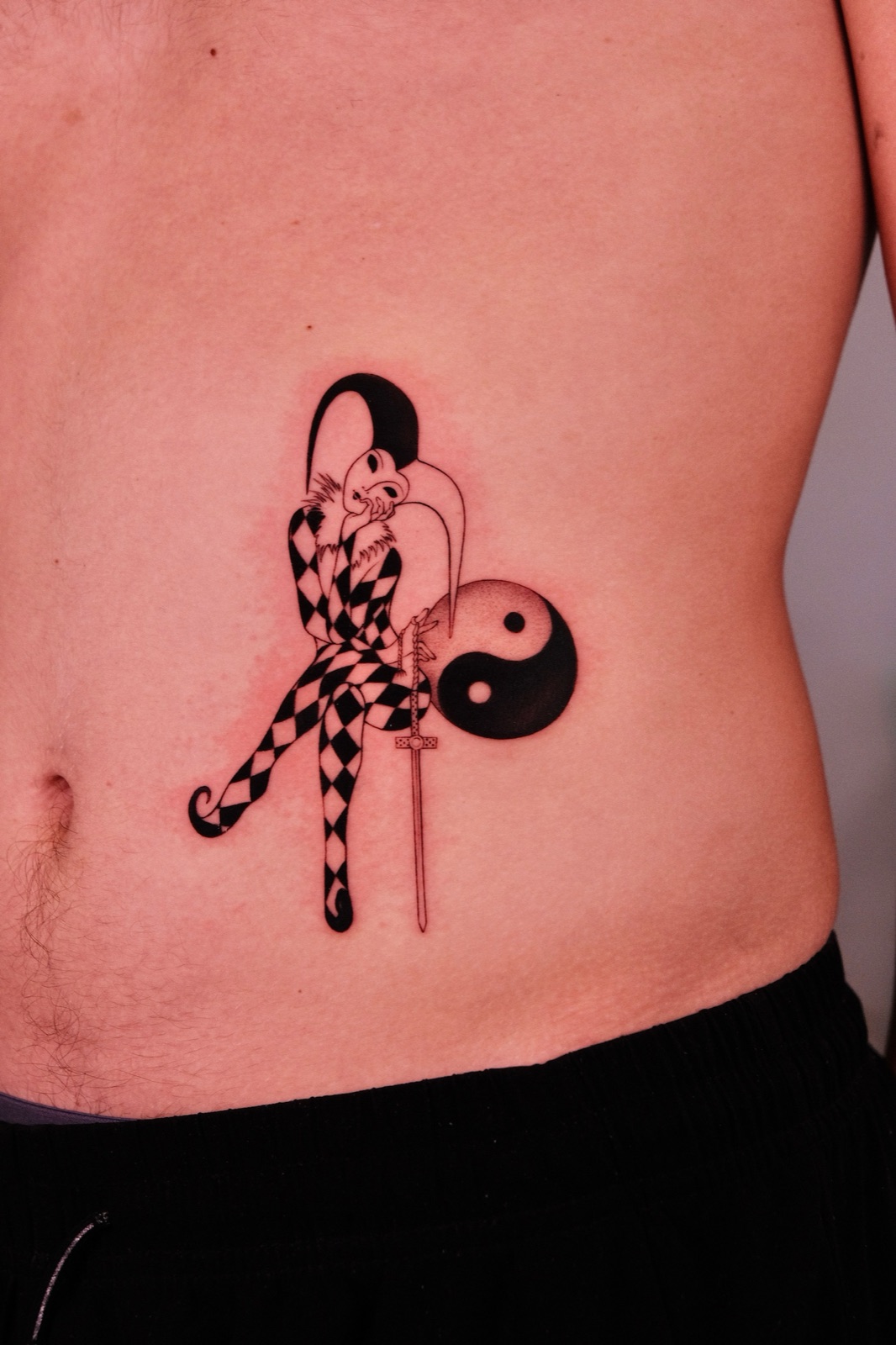 Harlequin Jester Sword Yinyang Tattoo Ribs — Su Tran Tattoo