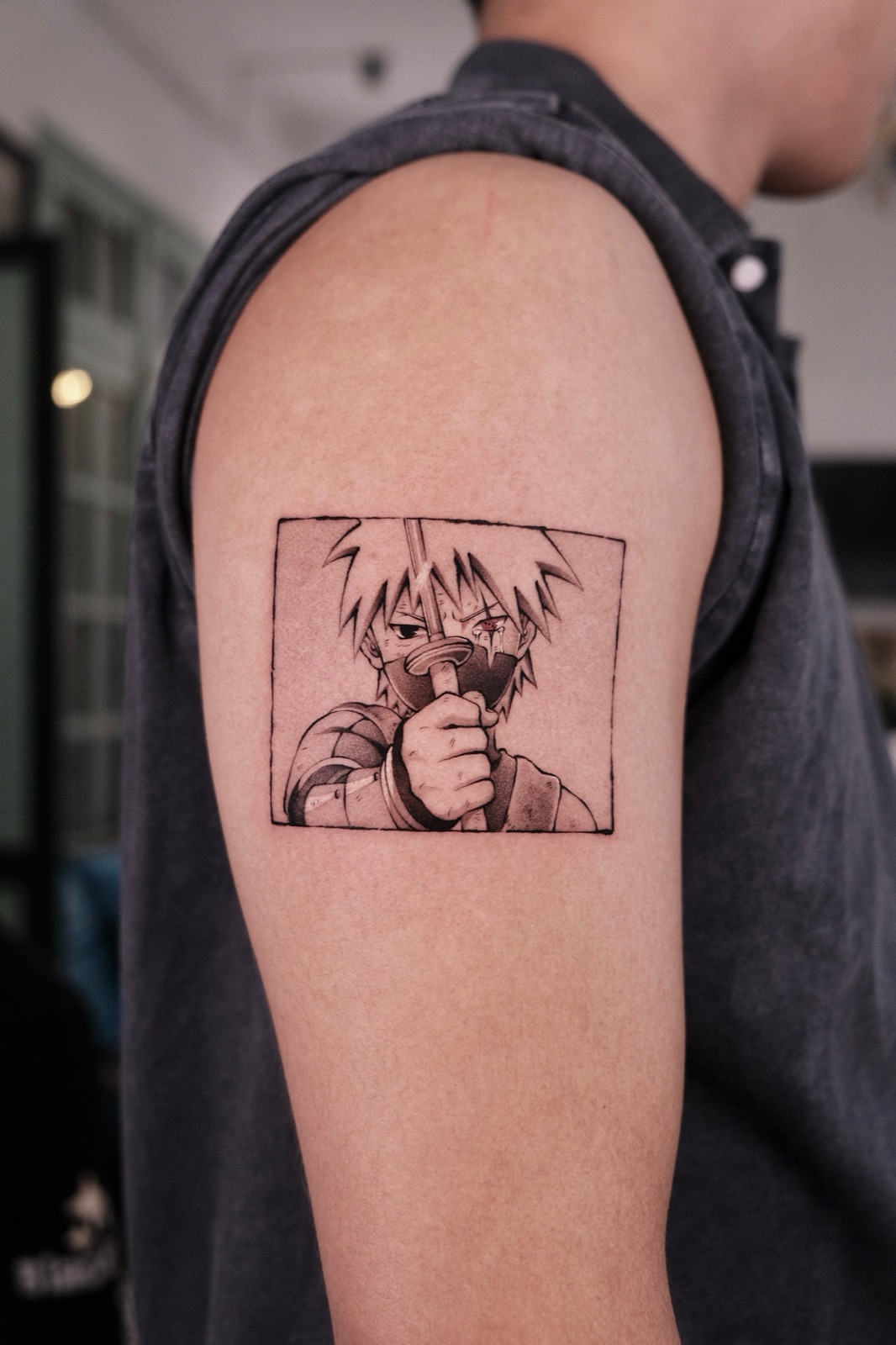 Manga-style character with sword tattoo on upper arm, illustrative blackwork panel