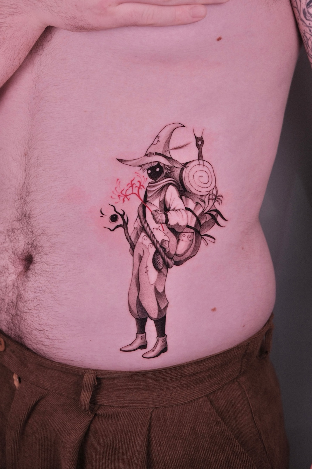 Witch Girl with Snail Backpack Tattoo on Stomach
