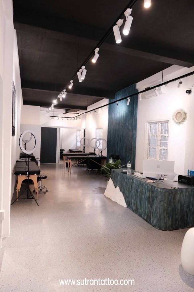Clean, bright interior of the Sutran piercing studio in District 1, Ho Chi Minh City